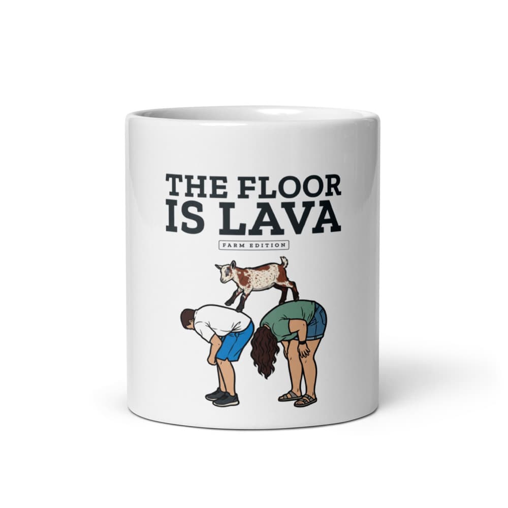 Ceramic mug printed with Cannoli the goat mid-leap in a floor-is-lava scene.