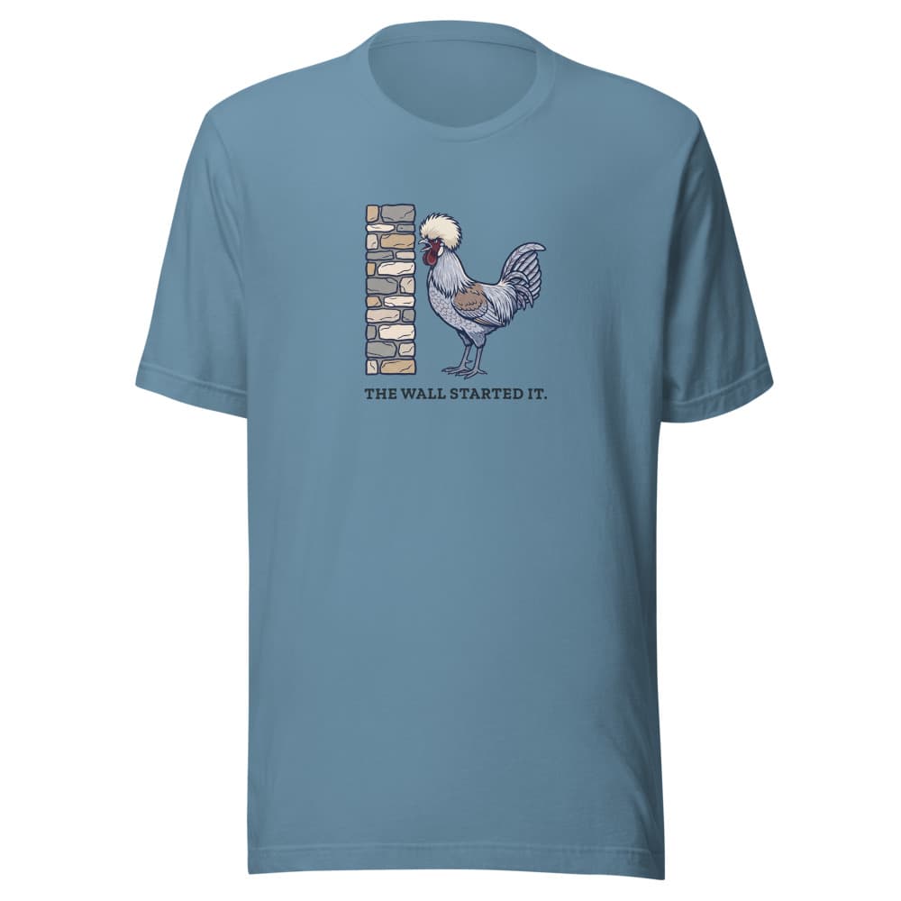 Light-colored t-shirt printed with cartoon Dippy Egg the rooster and the words the wall started it. Shown in Steel Blue.