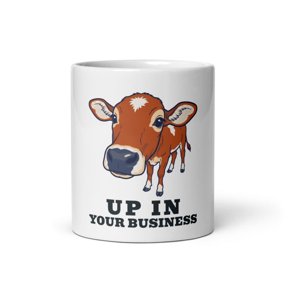 Ceramic mug printed with cartoon Jack the mini zebu and the words up in your business.